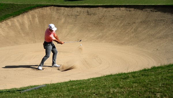 Denny McCarthy hits out of bunker on the 17th hole during the third round of the Sony Open golf tournament, Saturday, Jan. 11, 2025, at Waialae Country Club in Honolulu. (AP Photo/Matt York)