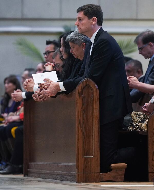 B.C. Premier David Eby attends mass at Holy Rosary Cathedral on a provincial day of mourning for the victims of the vehicle-ramming attack at the Filipino community's Lapu Lapu Day festival last week, in Vancouver, on Friday, May 2, 2025. (Darryl Dyck/The Canadian Press via AP)
