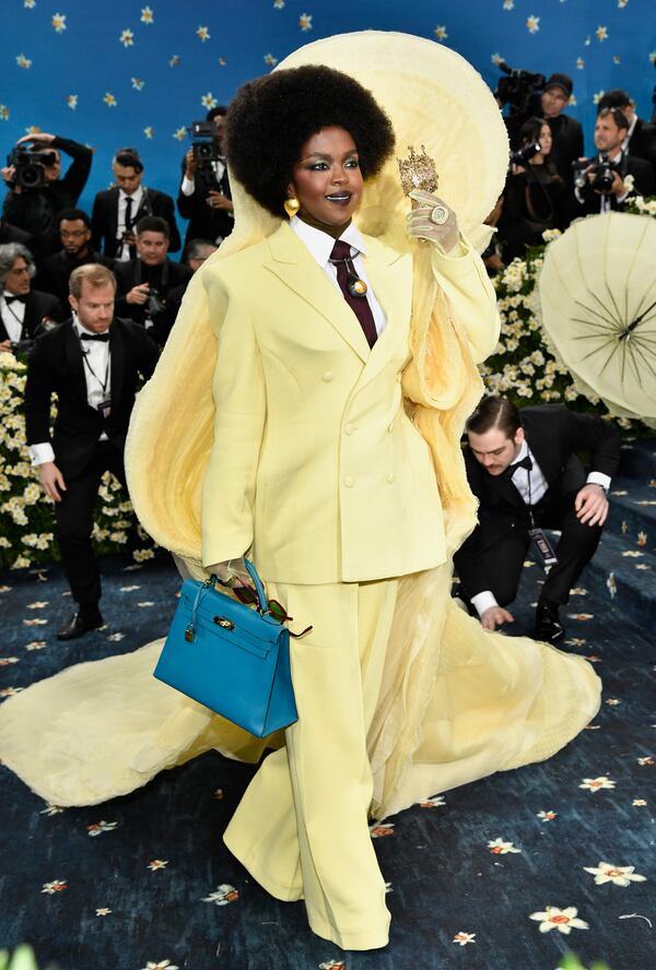 Lauryn Hill attends The Metropolitan Museum of Art's Costume Institute benefit gala celebrating the opening of the "Superfine: Tailoring Black Style" exhibition on Monday, May 5, 2025, in New York. (Photo by Evan Agostini/Invision/AP)