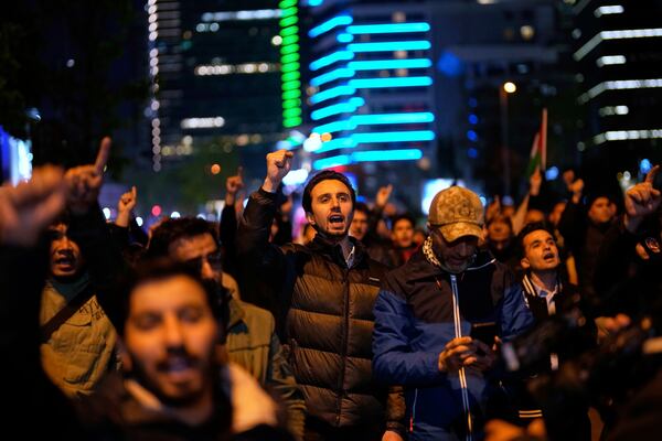 People protest against an Israeli drone attack on a vessel carrying aid to Gaza in international waters off Malta, outside the Israeli consulate in Istanbul, Friday, May 2, 2025. (AP Photo/Khalil Hamra)