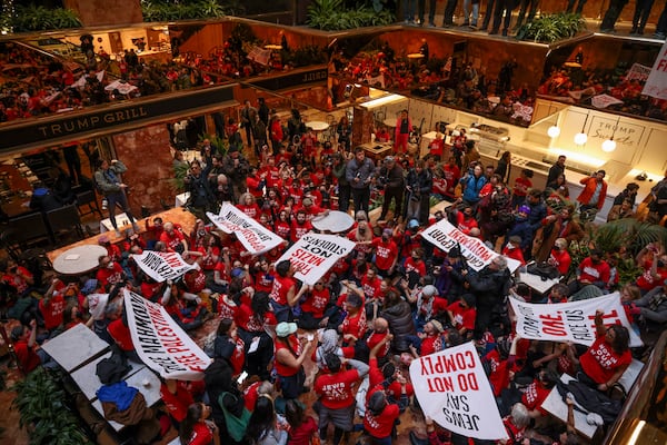 Demonstrators from the group, Jewish Voice for Peace, protest inside Trump Tower in support of Columbia graduate student Mahmoud Khalil, Thursday, March 13, 2025, in New York. (AP Photo/Yuki Iwamura)