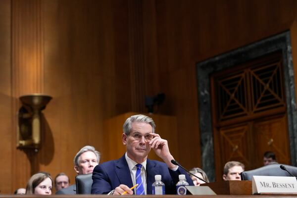 Scott Bessent, President-elect Donald Trump's choice to be Secretary of the Treasury, appears before the Senate Finance Committee for his confirmation hearing, at the Capitol in Washington, Thursday, Jan. 16, 2025. (AP Photo/Ben Curtis)