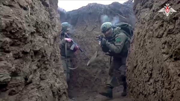 In this photo taken from video distributed by Russian Defense Ministry Press Service on Saturday, Jan. 4, 2025, Russian servicemen attend a combat training for assault units in an undisclosed location. (Russian Defense Ministry Press Service via AP)