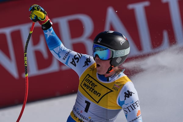 United States' Breezy Johnson celebrates at the finish area of a women's downhill race, at the Alpine Ski World Championships, in Saalbach-Hinterglemm, Austria, Saturday, Feb. 8, 2025. (AP Photo/Giovanni Auletta)