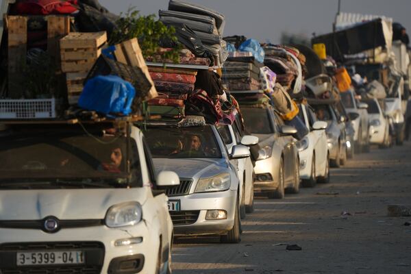 Displaced Palestinians make their way from central Gaza to their homes in the northern Gaza Strip, Wednesday, Jan. 29, 2025. after Israel began allowing hundreds of thousands of Palestinians to return as part of the ceasefire deal between Israel and Hamas. (AP Photo/Abdel Kareem Hana)