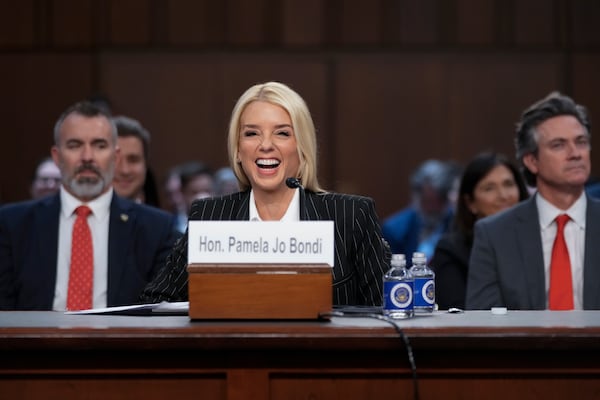 Pam Bondi, President-elect Donald Trump's choice to lead the Justice Department as attorney general, appears before the Senate Judiciary Committee for her confirmation hearing, at the Capitol in Washington, Wednesday, Jan. 15, 2025. (AP Photo/Ben Curtis)