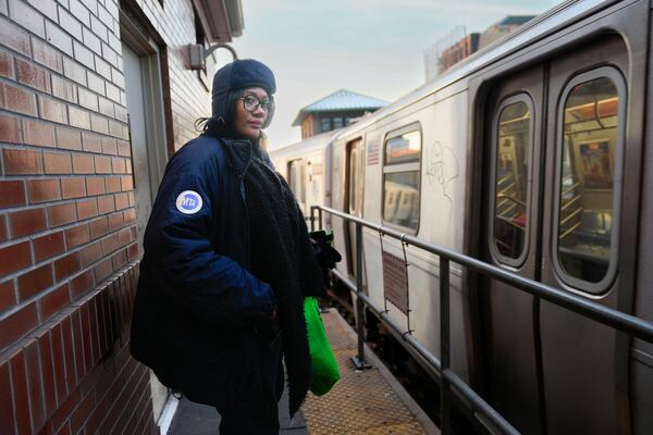 Subway train operator Tyesha Elcock watches the arrival of the train she will be operating in the Coney Island section of New York, Thursday, Jan. 23, 2025. (AP Photo/Seth Wenig)