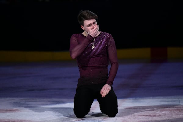 Max Naumov reacts after performing Sunday, March 2, 2025, in Washington at the Legacy on Ice event, a figure skating tribute to support the families and loved ones affected by the tragic Jan. 29, 2025, aviation incident. (AP Photo/Nick Wass)