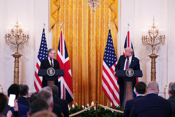 Britain's Prime Minister Keir Starmer, left, and U.S. President Donald Trump speak during a joint press conference in the East Room at the White House Thursday, Feb. 27, 2025, in Washington. (Carl Court/Pool Photo via AP)