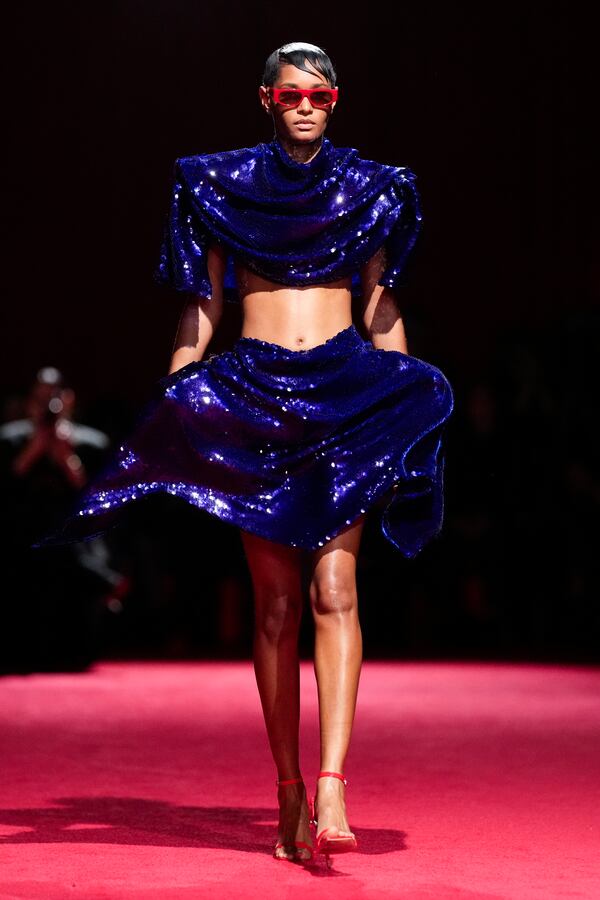 A model walks the runway during the Christian Siriano Fall/Winter 2025 fashion show at Chelsea Industrial during New York Fashion Week on Thursday, Feb. 6, 2025, in New York. (Photo by Charles Sykes/Invision/AP)