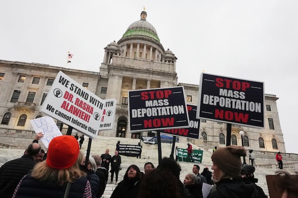 Protesters rally outside the Rhode Island State House in support of deported Brown University Dr. Rasha Alawieh, Monday, March 17, 2025, in Providence, R.I. (AP Photo/Charles Krupa)