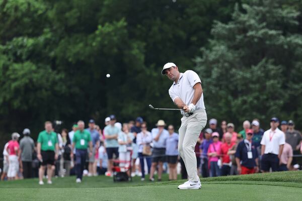 Scottie Scheffler chips off the fifth fairway during the first round of the CJ Cup Byron Nelson golf tournament in McKinney, Texas, Thursday, May 1, 2025. (AP Photo/Gareth Patterson)