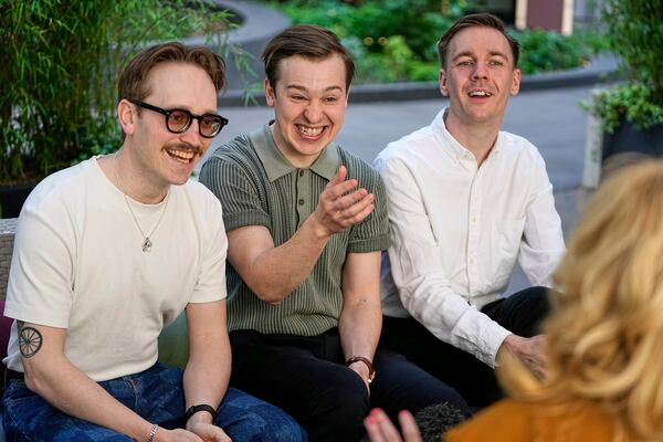 Swedish Eurovision contestants KAJ from Finland, Kevin Holmstrom, Jakob Norrgard and Axel Ahman, from right, give an interview with the Associated Press during the 69th Eurovision Song Contest week, in Basel, Switzerland, Thursday, May 15, 2025. (AP Photo/Martin Meissner)