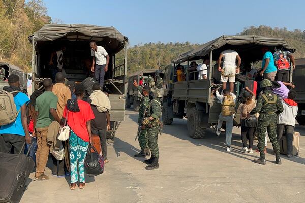 In this photo released by Royal Thai Army, more than 250 people from 20 nations who were reportedly rescued from alleged scam centers in Myanmar, as they crossed into Thailand's Tak province on Wednesday, Feb. 12, 2025. (Royal Thai Army, by Army Spokesperson via AP)