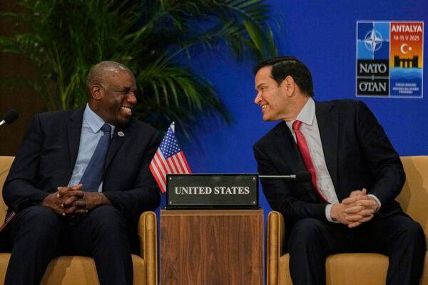 United States Secretary of State Marco Rubio, right, talks to British Foreign Secretary David Lammy during an informal meeting of NATO's foreign ministers in Antalya, southern Turkey, Thursday, May 15, 2025. (AP Photo/Khalil Hamra)