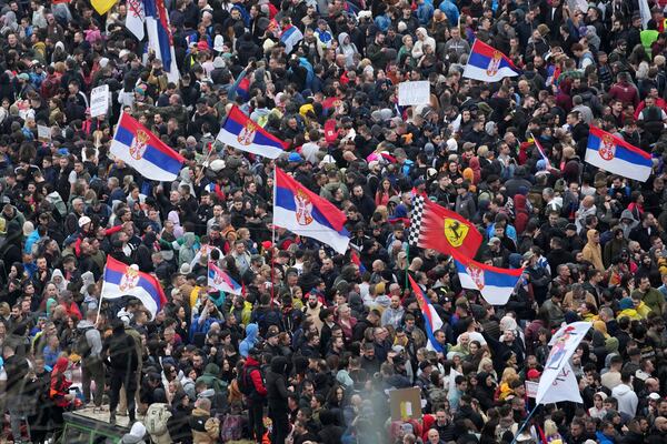 Protesters march during a major rally against populist President Aleksandar Vucic and his government, in downtown Belgrade, Serbia, Saturday, March 15, 2025. (AP Photo/Darko Vojinovic)