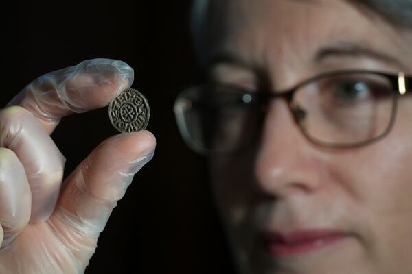 An early medieval silver penny of Guthrum of East Anglia, the first silver coin minted by a Viking ruler in Britain, is displayed at the British Museum's annual treasure launch in London, Tuesday, Feb. 11, 2025. (AP Photo/Kirsty Wigglesworth)