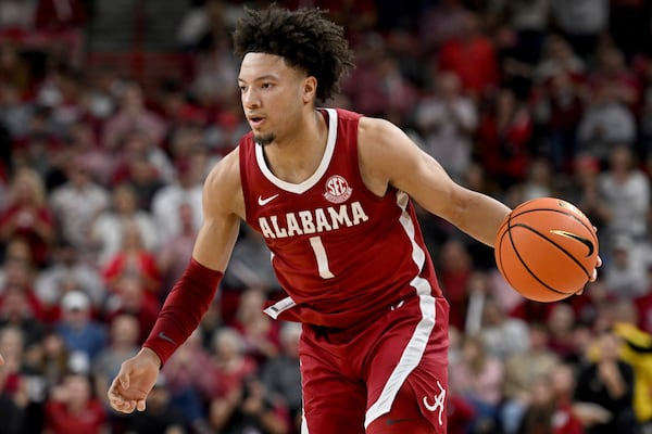 FILE - Alabama guard Mark Sears (1) runs a play against Arkansas during an NCAA college basketball game Saturday, Feb. 8, 2025, in Fayetteville, Ark. (AP Photo/Michael Woods, FIle(