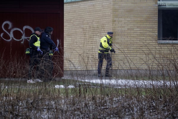 Police at the scene of an incident at Risbergska School, in Örebro, Sweden, Tuesday, Feb. 4, 2025. (Kicki Nilsson/TT News Agency via AP)