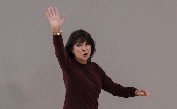 Fashion designer Veronique Nichanian acknowledges applause after the presentation of the men's Hermes Fall-Winter 2025-2026 collection in Paris, Saturday, Jan. 25, 2025. (AP Photo/Michel Euler)