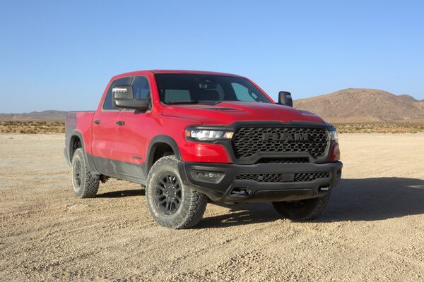 This photo provided by Ram shows the 2025 Ram 1500 Rebel. It features four-wheel drive, Bilstein shock absorbers, an electronic locking rear axle, all-terrain tires and a powerful six-cylinder engine. (Courtesy of Stellantis via AP)