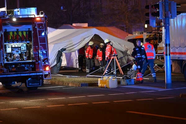 Emergency services attend an incident at the Christmas market in Magdeburg, Germany, Friday Dec. 20, 2024. (Heiko Rebsch/dpa via AP)