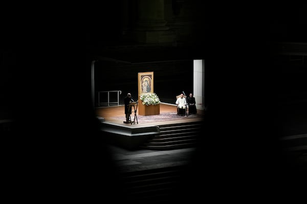 Cardinal Victor Manuel Fernandez, second from right, leads a rosary prayer for Pope Francis' health in St. Peter's Square at the Vatican, Friday, Feb. 28, 2025. (AP Photo/Andrew Medichini)