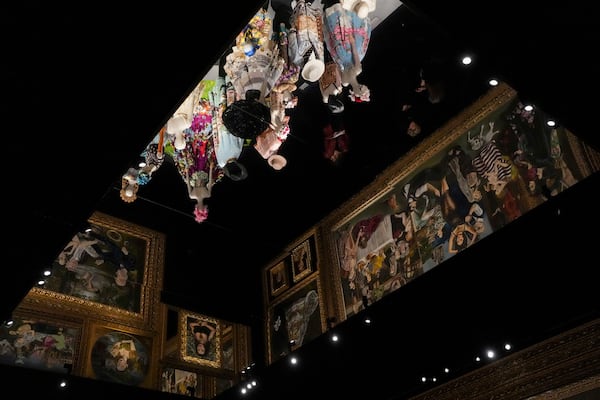 Creations are displayed during the exhibition "From the Heart to the Hands: Dolce&Gabbana" at the Grand Palais, in Paris, Thursday, Jan. 9, 2025. (AP Photo/Thibault Camus)