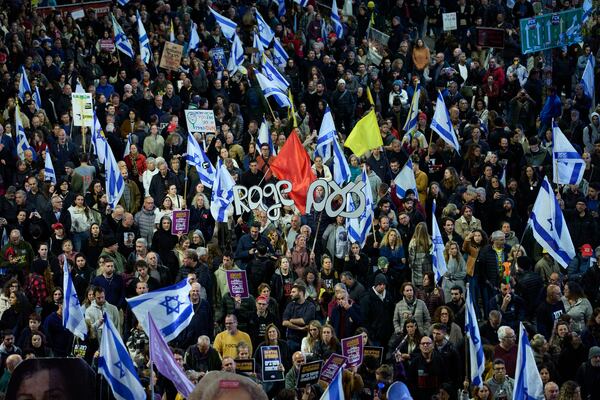 People take part in a protest demanding the immediate release of hostages held by Hamas in the Gaza Strip, in Tel Aviv, Israel, Saturday, March 22, 2025. (AP Photo/Ohad Zwigenberg)