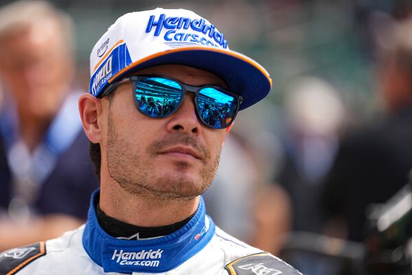 Kyle Larson watches as he waits for is turn during qualification for the Indianapolis 500 auto race at Indianapolis Motor Speedway in Indianapolis, Saturday, May 17, 2025. (AP Photo/Michael Conroy)