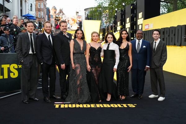 Lewis Pullman, from left, Wyatt Russell, David Harbour, Hannah John-Kamen, Florence Pugh, Julia Louis-Dreyfus, Geraldine Viswanathan, Wendell Pierce, and Jake Schreier pose for photographers upon arrival at a screening of the film 'Thunderbolts' on Tuesday, April 22, 2025, in London. (Photo by Scott A Garfitt/Invision/AP)