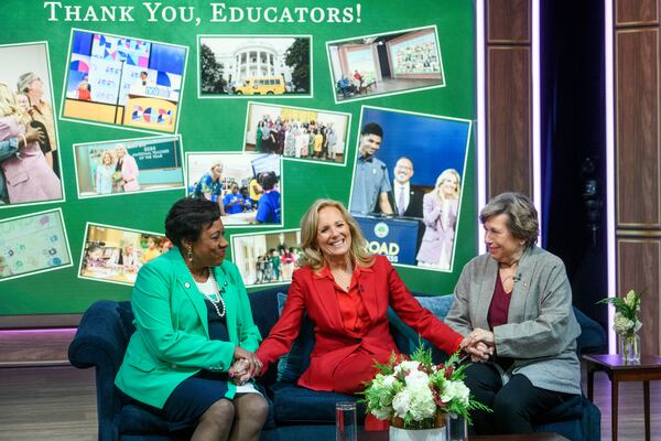 First lady Jill Biden, center, is joined by Becky Pringle, president of the National Education Association, left, and Randi Weingarten, president of American Federation of Teachers , right, during a virtual thank you event for educators with the American Federation of Teachers and the National Education Association, in the South Court Auditorium on the White House complex in Washington, Monday, Dec. 16, 2024. (AP Photo/Rod Lamkey, Jr.)