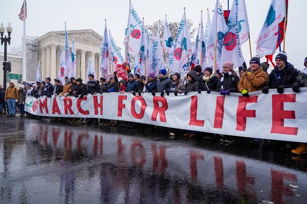 FILE - People participating in the March for Life walk past the Supreme Court, Jan. 19, 2024, in Washington. (AP Photo/Jacquelyn Martin, File)