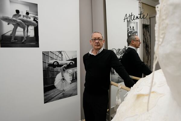 Photographer Gerard Uferas poses during the unveiling at La Scala Opera House of the photo exhibition 'Lo sguardo nascosto' ( The hidden gaze), in Milan, Italy, Tuesday, Feb. 11, 2025. (AP Photo/Luca Bruno)