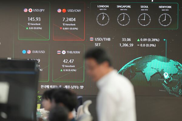 The screens showing the foreign exchange rates are seen at a dealing room of Hana Bank in Seoul, South Korea, Friday, May 9, 2025. (AP Photo/Lee Jin-man)