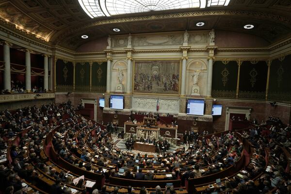 FILE - Lawmakers listen to French Prime Minister Francois Bayrou delivering his general policy speech, Jan. 14, 2025 at the National Assembly in Paris. (AP Photo/Thibault Camus, file)