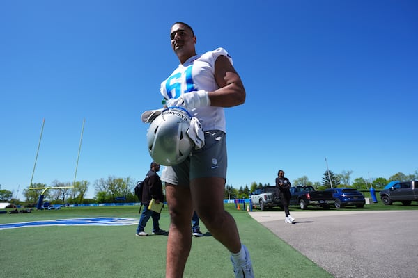 Detroit Lions defensive lineman Ahmed Hassanein (61) walks off the field after the NFL football team's rookie minicamp in Allen Park, Mich., Friday, May 9, 2025. (AP Photo/Paul Sancya)