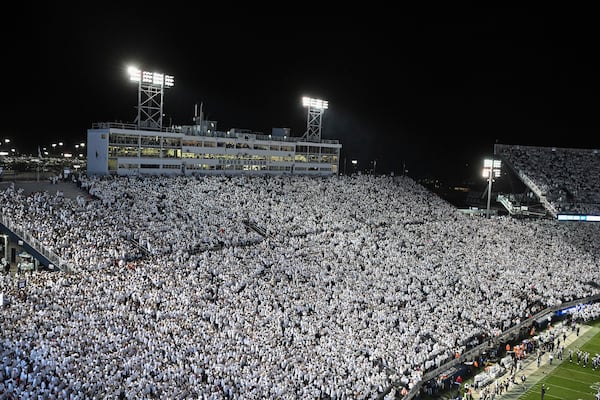 FILE - Penn State takes the field for an NCAA college football game against Washington amidst a "whiteout" crowd at Beaver Stadium, Saturday, Nov. 9, 2024, in State College, Pa. (AP Photo/Barry Reeger, File)