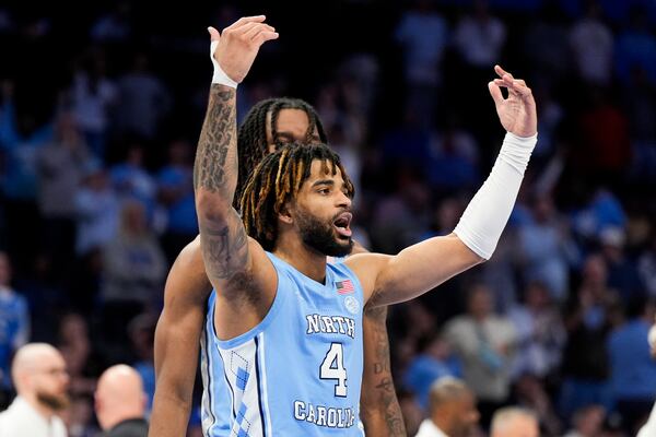 North Carolina guard RJ Davis celebrates after scoring against Wake Forest during the second half of an NCAA college basketball game in the quarterfinals of the Atlantic Coast Conference tournament, Thursday, March 13, 2025, in Charlotte, N.C. (AP Photo/Chris Carlson)