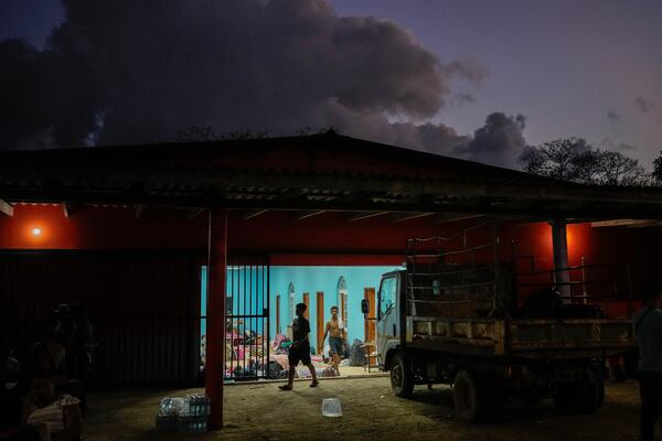 Migrants spend the night in a shelter in Palenque, Panama, Wednesday, Feb. 26, 2025. The migrants are returning from southern Mexico after giving up on reaching the U.S., a reverse flow triggered by the Trump administration's immigration crackdown. (AP Photo/Matias Delacroix)