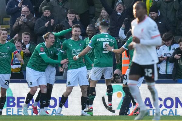 Plymouth Argyle's Ryan Hardie celebrates after scoring his side's opening goal from the penalty spot during the English FA Cup fourth round soccer match between Plymouth Argyle and Liverpool at Home Park stadium in Plymouth, England, Sunday, Feb. 9, 2025. (AP Photo/Alastair Grant)