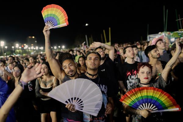 Fans cheer as they watch Lady Gaga free concert on Copacabana beach, in Rio de Janeiro, Saturday, May 3, 2025. (AP Photo/Bruna Prado)