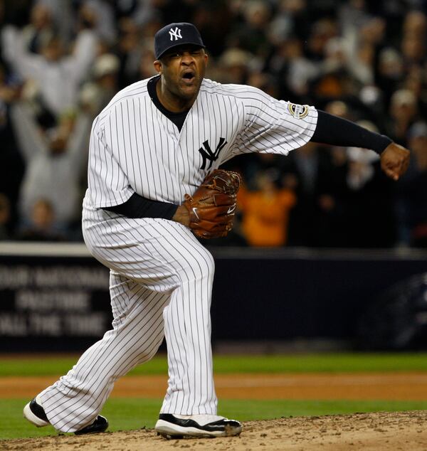 FILE - New York Yankees pitcher CC Sabathia reacts after Los Angeles Angels' Mike Napoli struck out swinging to end the top of the seventh inning of Game 1 of the American League Championship baseball series Friday, Oct. 16, 2009, in New York. (AP Photo/Kathy Willens, File)