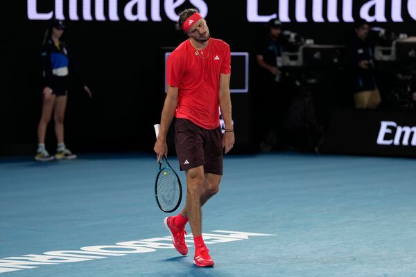 Alexander Zverev of Germany reacts during the men's singles final against Jannik Sinner of Italy at the Australian Open tennis championship in Melbourne, Australia, Sunday, Jan. 26, 2025. (AP Photo/Ng Han Guan)