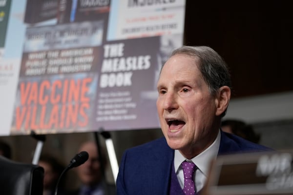 Committee Ranking Member Sen. Ron Wyden, D-Kansas, questions Robert F. Kennedy Jr., President Donald Trump's choice to be Secretary of Health and Human Services, as he appears before the Senate Finance Committee for his confirmation hearing, at the Capitol in Washington, Wednesday, Jan. 29, 2025. (AP Photo/Ben Curtis)