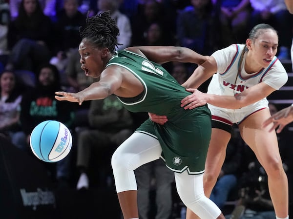 Vinyl's Dearica Hamby, right, fouls Rose's Chelsea Gray, left, during an Unrivaled 3-on-3 basketball game Friday, Jan. 17, 2025, in Medley, Fla. (AP Photo/Marta Lavandier)