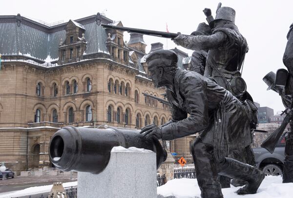 A statue titled "The Fight for Canada" stands across the street from the Office of the Prime Minister and Privy Council., Monday, Feb. 3, 2025 in Ottawa. The statue marks Canada's defeat of an American invasion in 1812. (Adrian Wyld/The Canadian Press via AP)