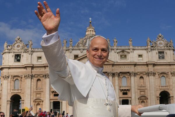 Pope Leo XIV on his popemobile tours St. Peter's Square at the Vatican prior to the inaugural Mass of his pontificate, Sunday, May 18, 2025. (AP Photo/Andrew Medichini)