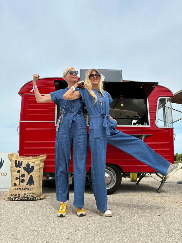 This photo provided by Etienne Martin shows Merete Buljo, right, and Tonje Thoresen, both from Norway, posing during the 5-day Princesses Rally in Chateau de Syam, central France, on May 19, 2025. (Etienne Martin via AP)