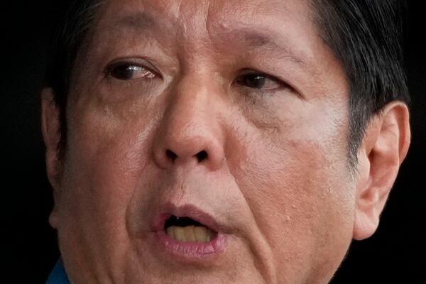 FILE -Philippine President Ferdinand Marcos Jr. speaks during the 89th anniversary of the Armed Forces of the Philippines at the military headquarters Camp Aguinaldo in Quezon City, Philippines on Dec. 20, 2024. (AP Photo/Aaron Favila, File)